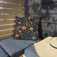 Thumbnail for Decorative floral pillow on a gray cushioned bench with a straw hat nearby.
