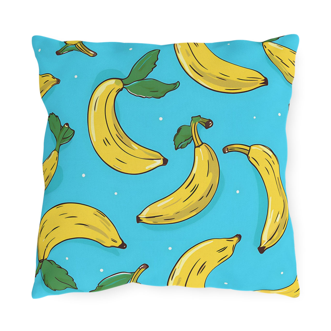 Pillow with banana pattern on a blue background