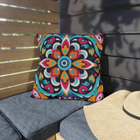 Thumbnail for Colorful patterned pillow on a gray cushion next to a wooden bench and straw hat.