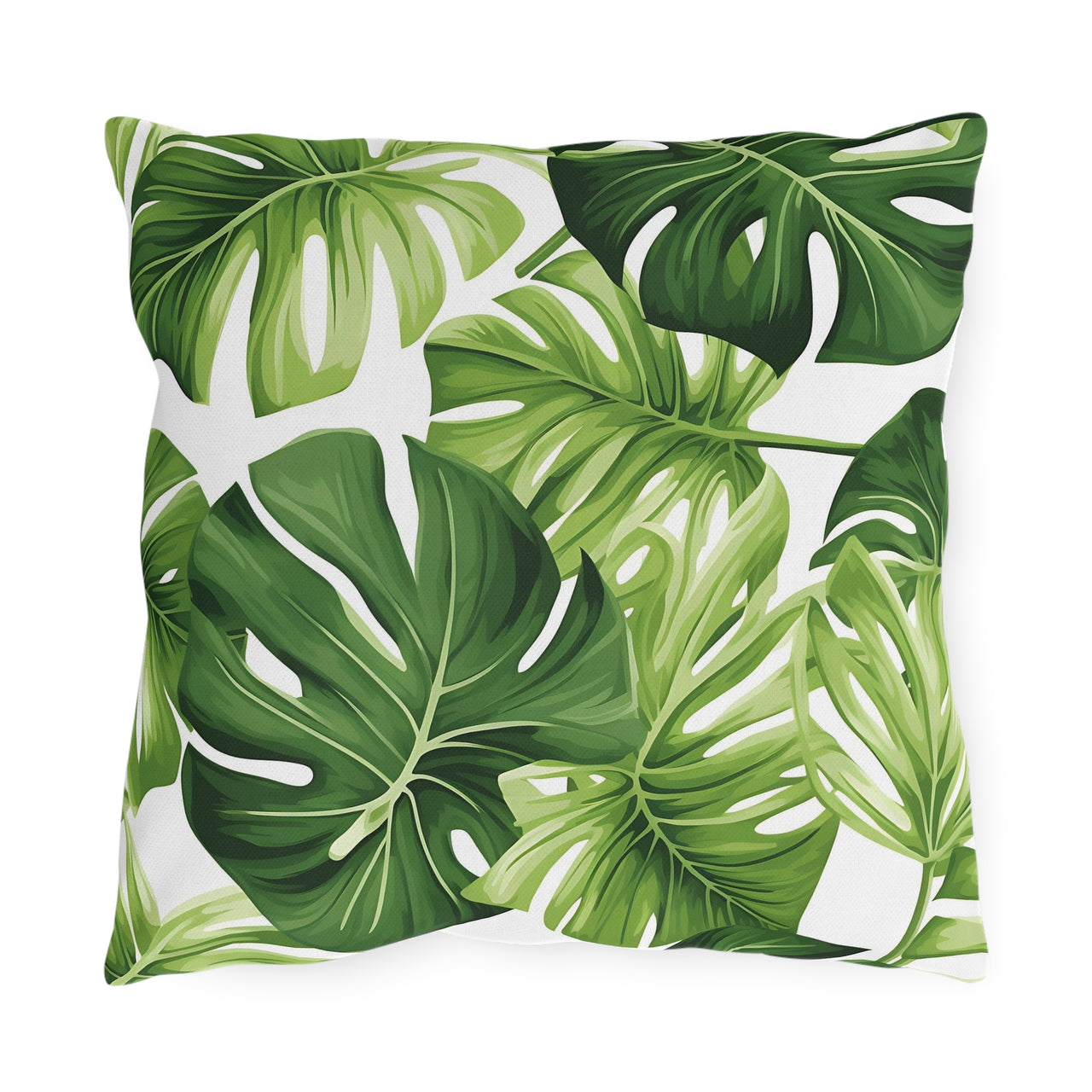 Pillow with green leaf monstera pattern on a white background