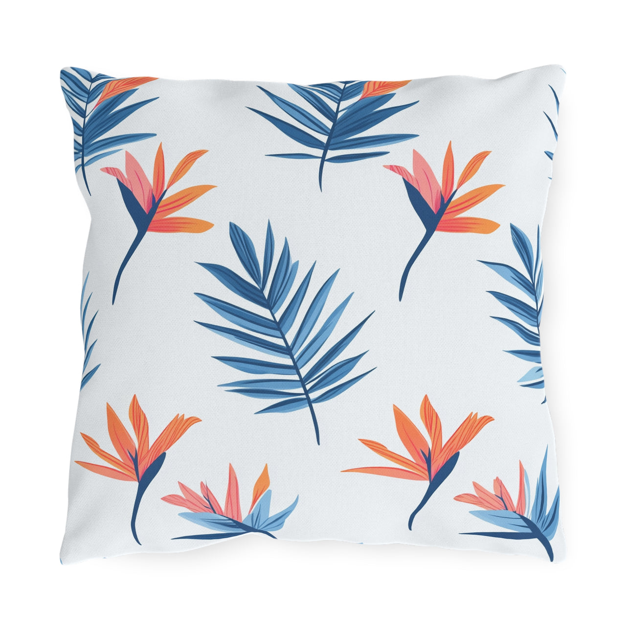 Pillow with blue and orange leaf pattern on a white background