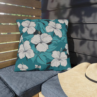 Thumbnail for Floral pillow on a bench with a straw hat nearby
