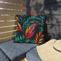 Thumbnail for Colorful leaf-patterned pillow on a bench with a straw hat nearby.